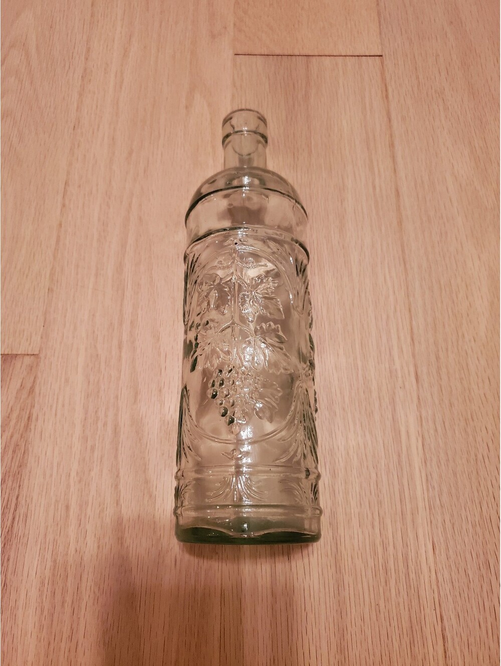 Vintage Embossed Glass Bottle with Grape Design